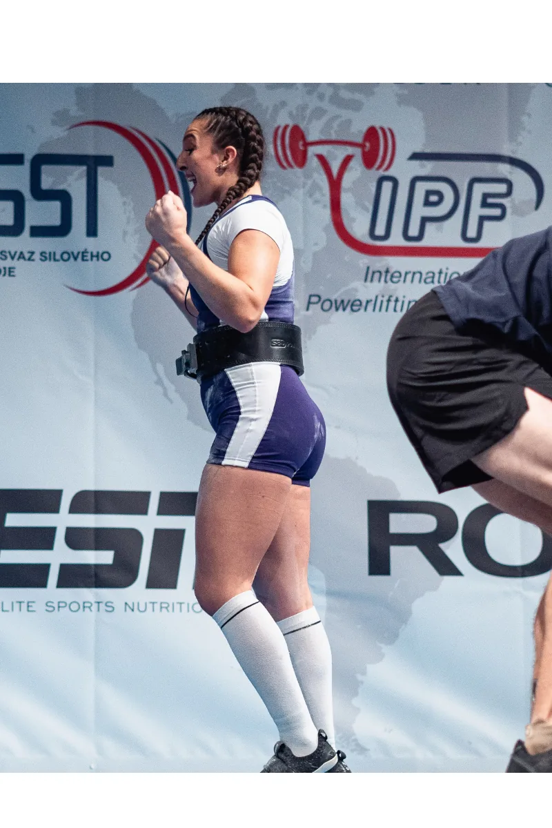 Mariella competing in powerlifting